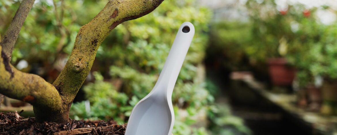 blurred-greenhouse-with-tool-plant-pot