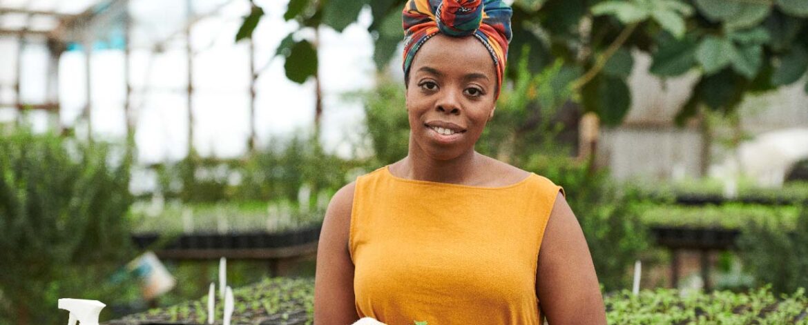 grenhouse-growers-african-lady-holding-plant-watch-this-video grenhouse-growers-african-lady-holding-plant-watch-this-video